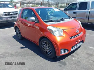 2012 Scion iQ z VIN JTNJJXB05CJ013263, wystawiony jako IAAI lot #42087710 z przebiegiem 124 463 mil mil oraz . Historia ofert i sprzedaży dostępna na DreamBid. Obrazek 1.