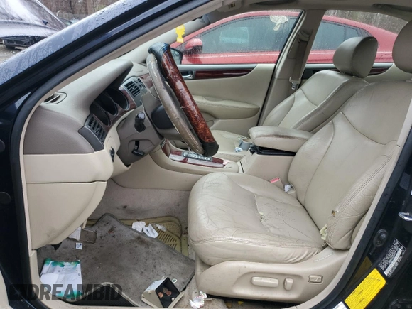 2003 Lexus ES 300 with VIN JTHBF30G036009951, listed as a Copart auction lot 50021235 with 231,411 mi miles and Salvage Title. Bid and sale history available at DreamBid. Image 7.