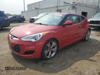 2013 Hyundai Veloster w/Gray Int z VIN KMHTC6AD1DU095784, wystawiony jako Copart lot #59350615 z przebiegiem 135 829 mil mil oraz Szkoda całkowita • Salvage title. Historia ofert i sprzedaży dostępna na DreamBid. Obrazek 1.