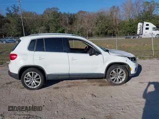 2015 Volkswagen Tiguan SE with VIN WVGAV7AX5FW600170, listed as a IAAI auction lot 41460660 with Not provided miles and . Bid and sale history available at DreamBid. Image 13.