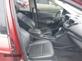 2014 Ford Escape Titanium with VIN 1FMCU0JXXEUB96456, listed as a IAAI auction lot 41700975 with 137,521 mi miles. Bid and sale history available at carsss.com. Image 5.