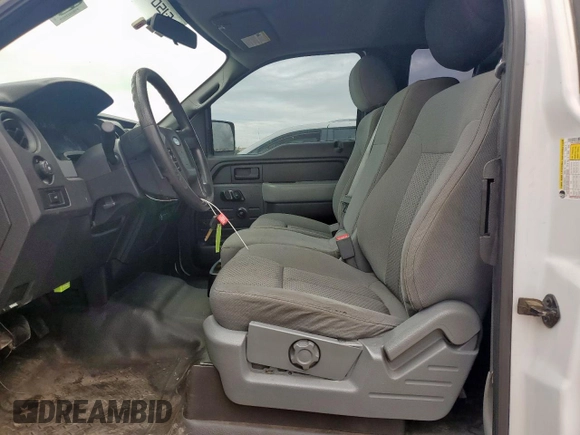 2012 Ford F-150 XL with VIN 1FTFX1ET2CFD02180, listed as a Copart auction lot 61810405 with 218,459 mi miles and Clean title. Bid and sale history available at DreamBid. Image 9.