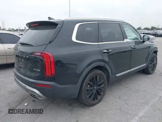 2021 Kia Telluride SX with VIN 5XYP54HC8MG127732, listed as a IAAI auction lot 42106546 with 62,411 mi miles and . Bid and sale history available at DreamBid. Image 4.