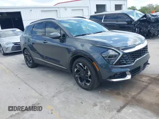 2024 Kia Sportage SX-Prestige with VIN 5XYK53DF6RG228361, listed as a IAAI auction lot 42102412 with 14,496 mi miles and . Bid and sale history available at DreamBid. Image 1.
