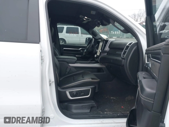 2023 Ram 1500 Laramie with VIN 1C6SRFJT3PN519364, listed as a IAAI auction lot 41553431 with 23,541 mi miles and . Bid and sale history available at DreamBid. Image 5.