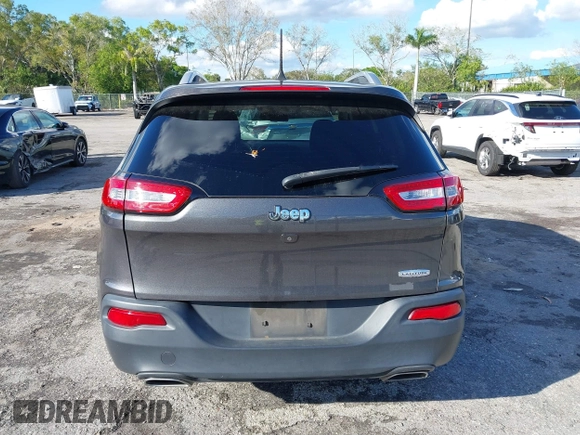 2016 Jeep Cherokee Altitude with VIN 1C4PJLCSXGW363598, listed as a IAAI auction lot 41670125 with 135,603 mi miles. Bid and sale history available at carsss.com. Image 16.