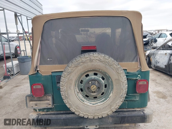 1997 Jeep Wrangler SE with VIN 1J4FY29P1VP408966, listed as a IAAI auction lot 41683640 with 106,910 mi miles. Bid and sale history available at carsss.com. Image 16.