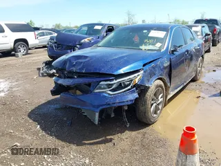 2020 Kia Optima LX with VIN 5XXGT4L38LG407103, listed as a IAAI auction lot 42130742 with 76,841 mi miles and . Bid and sale history available at DreamBid. Image 6.