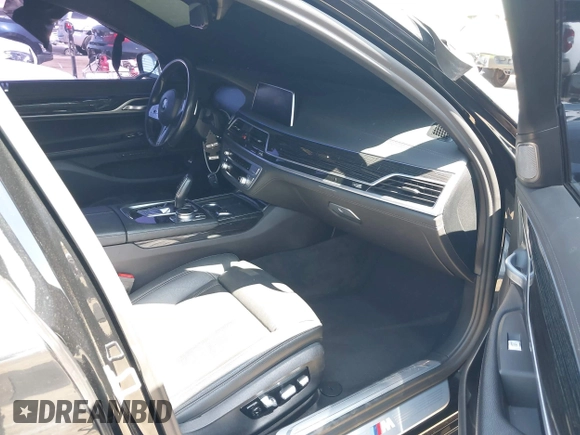 2022 BMW 7 Series 740i with VIN WBA7T2C07NCG88615, listed as a IAAI auction lot 39972481 with 76,169 mi miles. Bid and sale history available at carsss.com. Image 5.