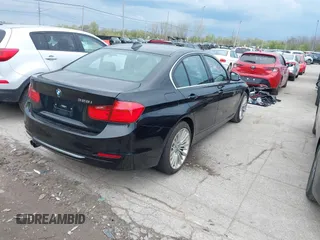 2012 BMW 3 Series 328i with VIN WBA3A5C59CF342687, listed as a IAAI auction lot 42116175 with 139,559 mi miles. Bid and sale history available at carsss.com. Image 4.
