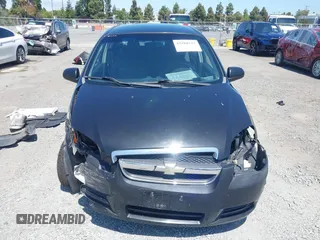 2008 Chevrolet Aveo LS with VIN KL1TD56678B123487, listed as a IAAI auction lot 42588212 with 119,882 mi miles and . Bid and sale history available at DreamBid. Image 13.