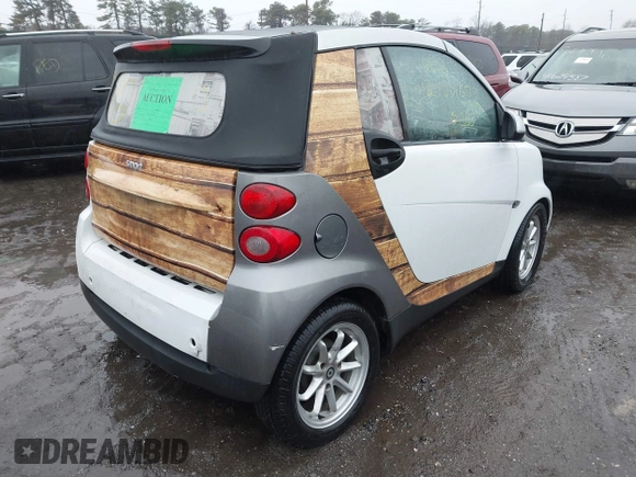 2009 Smart fortwo Passion with VIN WMEEK31X69K218783, listed as a IAAI auction lot 41604398 with Not Provided miles and . Bid and sale history available at DreamBid. Image 4.