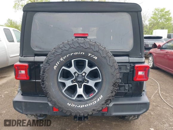 2021 Jeep Wrangler Unlimited Sport S z VIN 1C4HJXDG0MW788779, wystawiony jako IAAI lot #42137430 z przebiegiem 52 903 mil mil oraz . Historia ofert i sprzedaży dostępna na DreamBid. Obrazek 16.