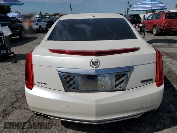 2014 Cadillac XTS Premium with VIN 2G61P5S36E9305491, listed as a Copart auction lot 44404425 with 104,710 mi miles and Salvage Title. Bid and sale history available at DreamBid. Image 6.