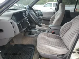 1995 Jeep Grand Cherokee Laredo z VIN 1J4GZ58S2SC578183, wystawiony jako Copart lot #61665955 z przebiegiem 341 135 mil mil oraz Szkoda całkowita • Salvage title. Historia ofert i sprzedaży dostępna na DreamBid. Obrazek 7.