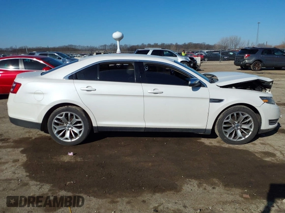 2014 Ford Taurus Limited with VIN 1FAHP2F89EG155934, listed as a IAAI auction lot 41760703 with 130,280 mi miles. Bid and sale history available at carsss.com. Image 14.