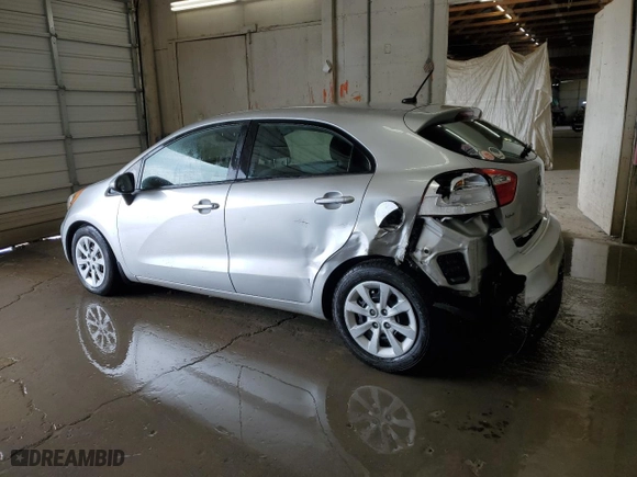 2013 Kia Rio LX with VIN KNADM5A30D6213543, listed as a Copart auction lot 50746755 with 121,205 mi miles and Salvage Title. Bid and sale history available at carsss.com. Image 2.