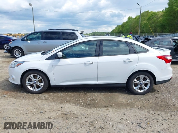 2012 Ford Focus SE with VIN 1FAHP3F2XCL122141, listed as a IAAI auction lot 42008877 with 122,743 mi miles. Bid and sale history available at carsss.com. Image 14.