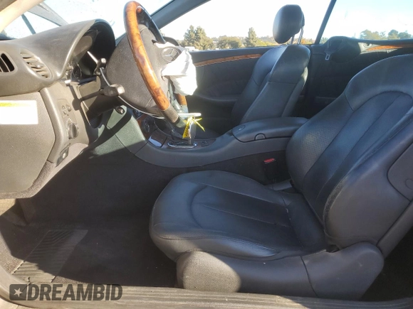2005 Mercedes-Benz CLK 500 with VIN WDBTK75J05F137914, listed as a Copart auction lot 75536144 with 180,876 mi miles and Clean Title. Bid and sale history available at DreamBid. Image 7.