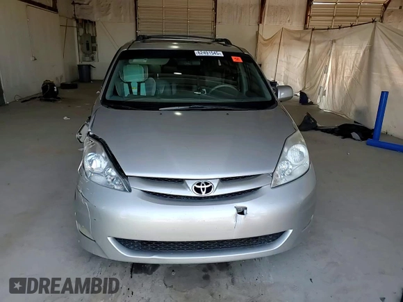 2010 Toyota Sienna XLE with VIN 5TDYK4CCXAS323450, listed as a Copart auction lot 62491545 with 220,121 mi miles and Salvage title. Bid and sale history available at DreamBid. Image 14.