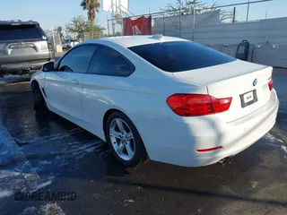 2014 BMW 4 Series 428i with VIN WBA3N7C50EF718812, listed as a IAAI auction lot 41349128 with 67,581 mi miles and . Bid and sale history available at carsss.com. Image 3.