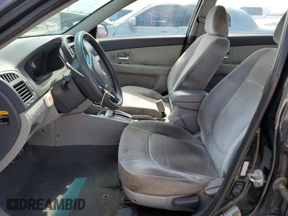 2009 Kia Spectra EX with VIN KNAFE222795620430, listed as a Copart auction lot 51170895 with 172,719 mi miles and Salvage Title. Bid and sale history available at carsss.com. Image 7.