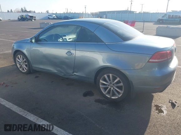 2012 Volkswagen Eos Komfort with VIN WVWBW7AH1CV022066, listed as a IAAI auction lot 41950391 with 98,877 mi miles and . Bid and sale history available at DreamBid. Image 3.
