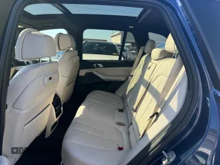2021 BMW X5 M50i with VIN 5UXJU4C00M9H36466, listed as a Copart auction lot 77444344 with 100,119 mi miles and Clean Title. Bid and sale history available at carsss.com. Image 5.