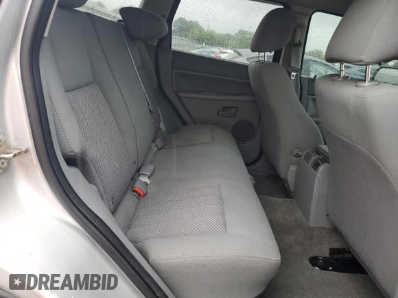 2005 Jeep Grand Cherokee Laredo with VIN 1J4GR48K55C719634, listed as a Copart auction lot 61809195 with 141,316 mi miles and Salvage title. Bid and sale history available at DreamBid. Image 11.