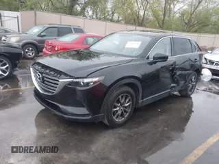 2016 Mazda CX-9 Touring with VIN JM3TCBCY5G0101490, listed as a IAAI auction lot 42062846 with 85,352 mi miles and . Bid and sale history available at DreamBid. Image 17.