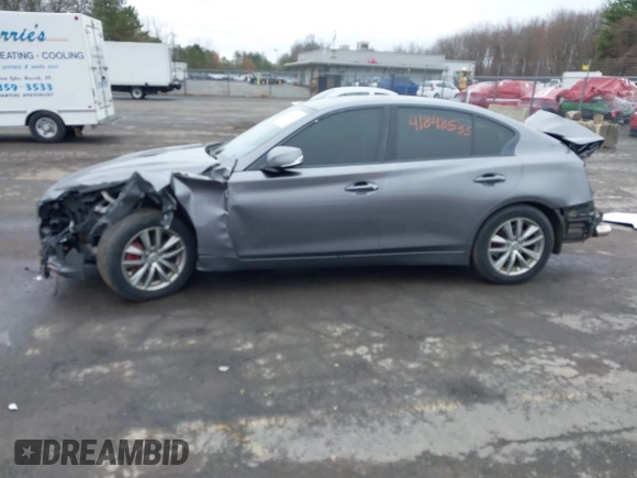 2014 Infiniti Q50 Premium with VIN JN1BV7AR8EM682452, listed as a IAAI auction lot 41848533 with 103,646 mi miles. Bid and sale history available at carsss.com. Image 15.