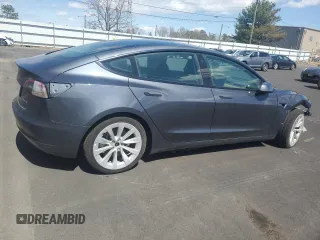 2022 Tesla Model 3 Long Range with VIN 5YJ3E1EBXNF188596, listed as a Copart auction lot 51846915 with 49,271 mi miles and Non Repairable. Bid and sale history available at carsss.com. Image 3.