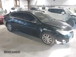 2014 Toyota Avalon Limited with VIN 4T1BK1EB0EU114093, listed as a IAAI auction lot 41311332 with 103,479 mi miles. Bid and sale history available at carsss.com. Image 1.