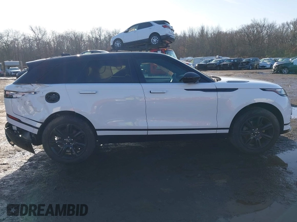 2022 Land Rover Range Rover Velar R-Dynamic S z VIN SALYT2EX7NA341627, wystawiony jako IAAI lot #41111238 z przebiegiem 18 982 mil mil oraz . Historia ofert i sprzedaży dostępna na DreamBid. Obrazek 13.
