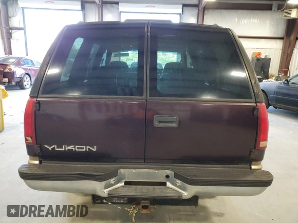 1997 GMC Yukon with VIN 1GKEC13R2VJ734299, listed as a Copart auction lot 74988224 with 225,335 mi miles and Salvage Title. Bid and sale history available at carsss.com. Image 6.