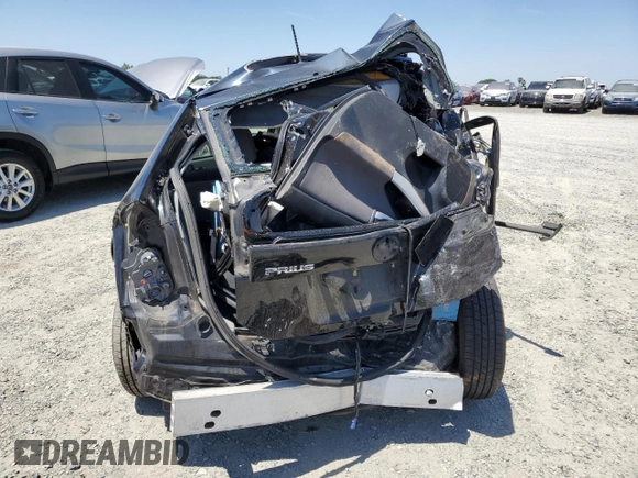 2013 Toyota Prius One z VIN JTDKN3DU7D0345945, wystawiony jako Copart lot #57703325 z przebiegiem Nie podano mil oraz Szkoda całkowita • Salvage title. Historia ofert i sprzedaży dostępna na DreamBid. Obrazek 6.