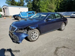 2018 Mercedes-Benz E 300 with VIN WDDZF4KB2JA319624, listed as a Copart auction lot 55624075 with 36,655 mi miles and Salvage title. Bid and sale history available at DreamBid. Image 1.