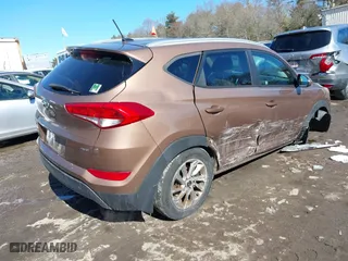 2016 Hyundai Tucson SE with VIN KM8J3CA4XGU063653, listed as a IAAI auction lot 41622270 with 103,270 mi miles. Bid and sale history available at carsss.com. Image 4.