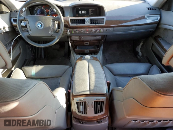 2002 BMW 7 Series 745i with VIN WBAGL63462DP57016, listed as a Copart auction lot 81025594 with 121,870 mi miles and Salvage Title. Bid and sale history available at DreamBid. Image 8.