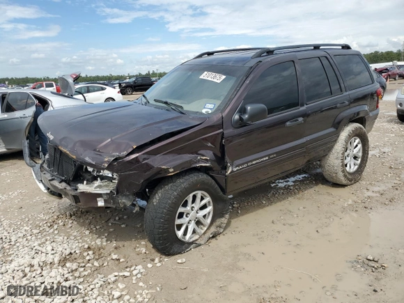 2004 Jeep Grand Cherokee Laredo with VIN 1J4GX48S44C150571, listed as a Copart auction lot 51013675 with 260,986 mi miles and Salvage Title. Bid and sale history available at carsss.com. Image 1.