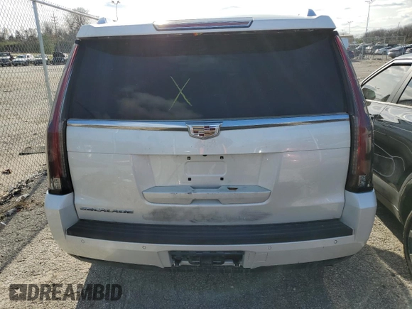 2015 Cadillac Escalade Luxury z VIN 1GYS4MKJ3FR690464, wystawiony jako Copart lot #59001372 z przebiegiem Nie podano mil oraz Szkody całkowita. Historia ofert i sprzedaży dostępna na DreamBid. Obrazek 6.