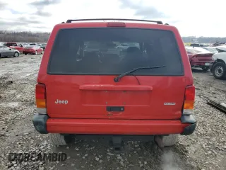 2000 Jeep Cherokee Police with VIN 1J4FF48S7YL204028, listed as a Copart auction lot 85516694 with 233,547 mi miles and Salvage Title. Bid and sale history available at carsss.com. Image 6.