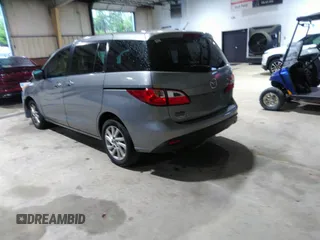 2013 Mazda 5 Sport with VIN JM1CW2BL5D0156684, listed as a IAAI auction lot 41966696 with 121,654 mi miles and . Bid and sale history available at DreamBid. Image 3.