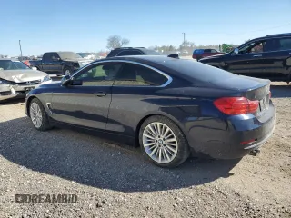 2015 BMW 4 Series 428i with VIN WBA3N3C56FK232040, listed as a Copart auction lot 49974885 with 48,450 mi miles and Salvage Title. Bid and sale history available at DreamBid. Image 2.