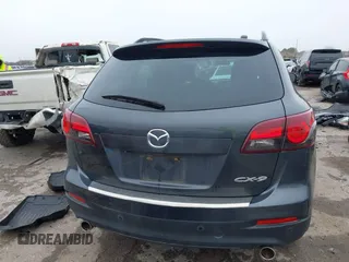 2014 Mazda CX-9 Touring with VIN JM3TB2CA1E0427984, listed as a IAAI auction lot 41620770 with 88,305 mi miles and . Bid and sale history available at DreamBid. Image 17.
