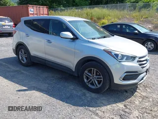 2018 Hyundai Santa Fe 2.4L z VIN 5XYZTDLB1JG546708, wystawiony jako IAAI lot #42399917 z przebiegiem 131 932 mil mil oraz . Historia ofert i sprzedaży dostępna na DreamBid. Obrazek 1.