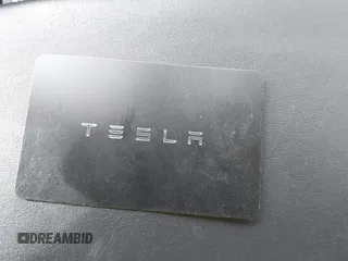 2019 Tesla Model 3 Long Range with VIN 5YJ3E1EB7KF442390, listed as a IAAI auction lot 41700122 with 65,539 mi miles. Bid and sale history available at carsss.com. Image 11.