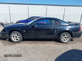 2004 Ford Mustang Standard with VIN 1FAFP40604F156534, listed as a IAAI auction lot 41794486 with 216,207 mi miles. Bid and sale history available at carsss.com. Image 15.