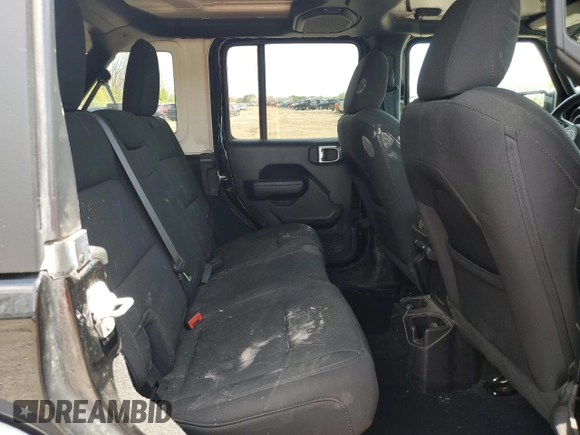 2023 Jeep Wrangler Sport S with VIN 1C4HJXDN9PW564543, listed as a Copart auction lot 56192945 with 42,015 mi miles and Salvage title. Bid and sale history available at DreamBid. Image 11.