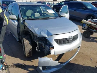 2009 Toyota Corolla with VIN JTDBL40E999021621, listed as a IAAI auction lot 41636462 with 123,650 mi miles. Bid and sale history available at carsss.com. Image 6.